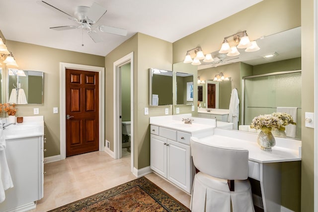 10492 Allen Rd, Pickerington, OH 43147 - full bathroom featuring two vanities, a shower stall, ceiling fan, and a chandelier