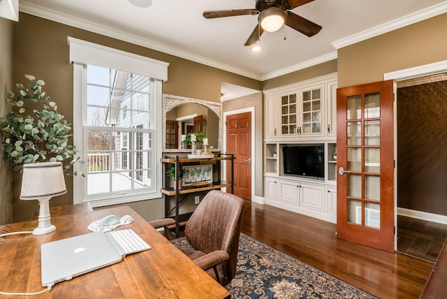 home office featuring ceiling fan, dark hardwood / wood-style flooring, ornamental molding, and french doors