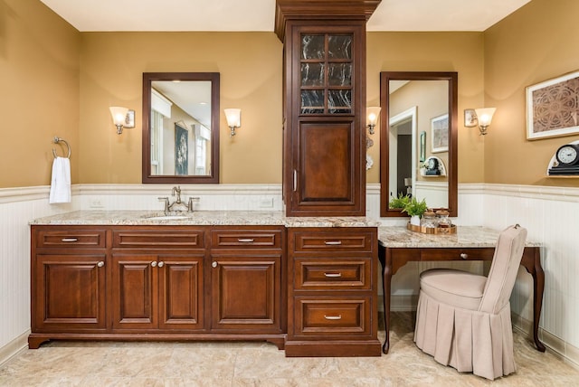 10492 Allen Rd, Pickerington, OH 43147 - bathroom featuring a wainscoted wall and vanity