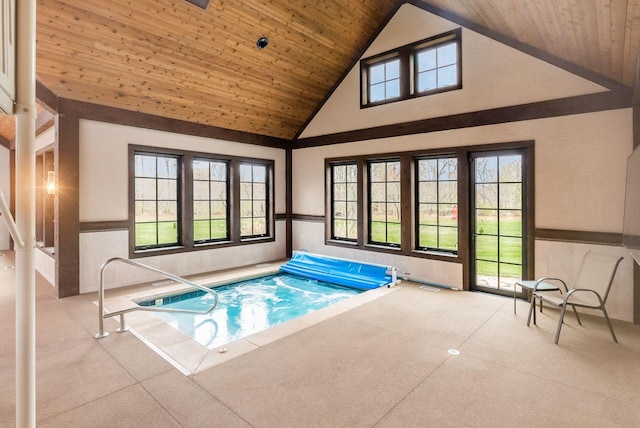 view of swimming pool with an indoor in ground hot tub