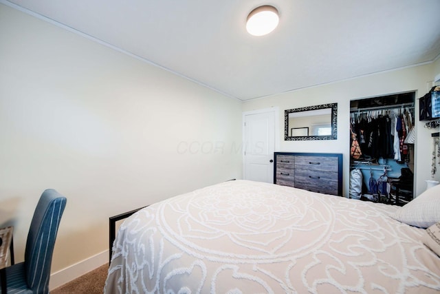 carpeted bedroom with a closet