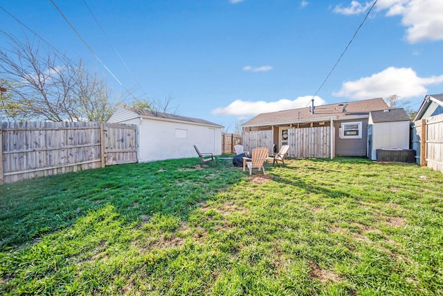 view of yard with a storage shed