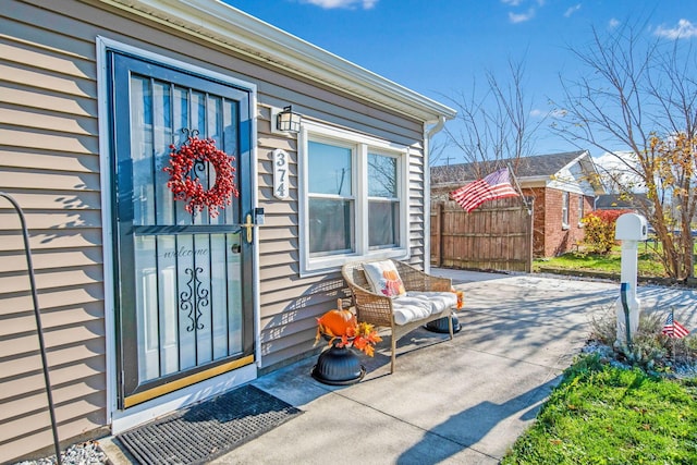 property entrance with a patio area