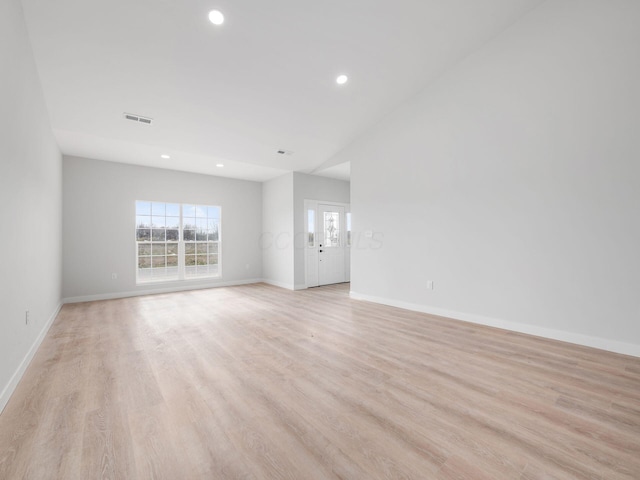 empty room with light wood-type flooring