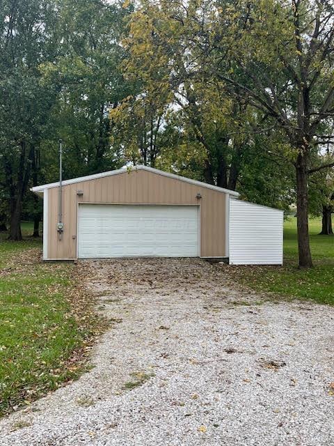 641/2 N Beaver St, Carroll, OH 43112 - detached garage featuring view of wooded area