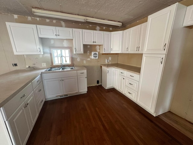 8565 Smith Calhoun Rd Unit 162, Plain City, OH 43064 - kitchen with dark wood-type flooring and white cabinetry