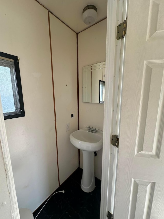 8565 Smith Calhoun Rd Unit 162, Plain City, OH 43064 - half bathroom with marble finish floors and toilet