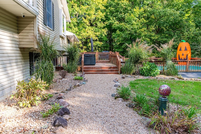 view of yard with a deck