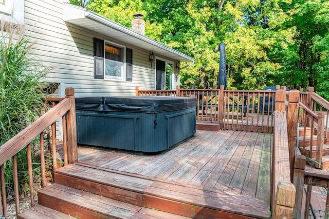 deck featuring a hot tub