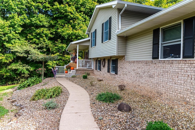 view of home's exterior featuring a porch