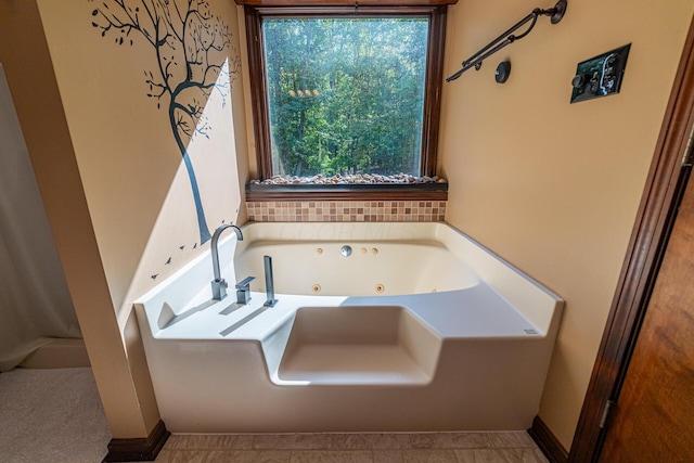 bathroom featuring a tub