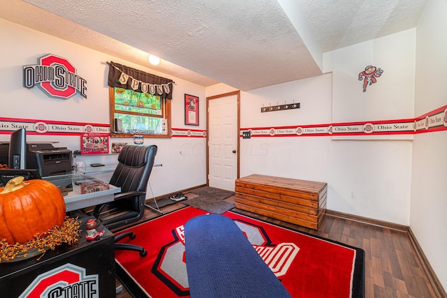 office with a textured ceiling and hardwood / wood-style floors