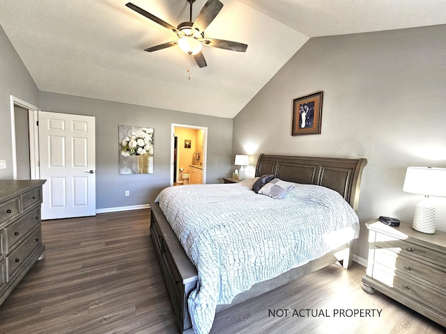 bedroom featuring ceiling fan, dark hardwood / wood-style flooring, and vaulted ceiling