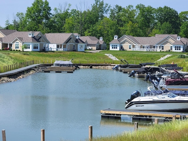 property view of water featuring a boat dock