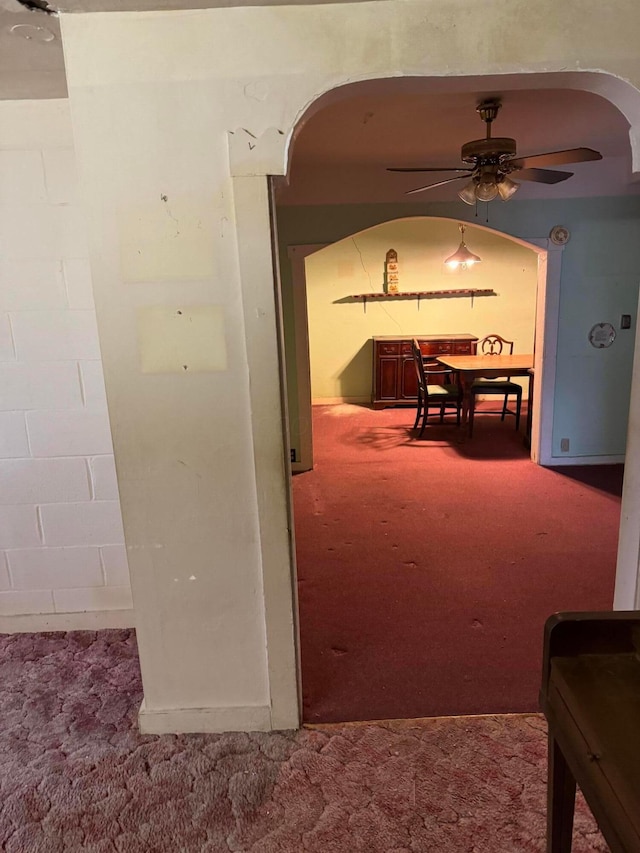 hallway with carpet flooring