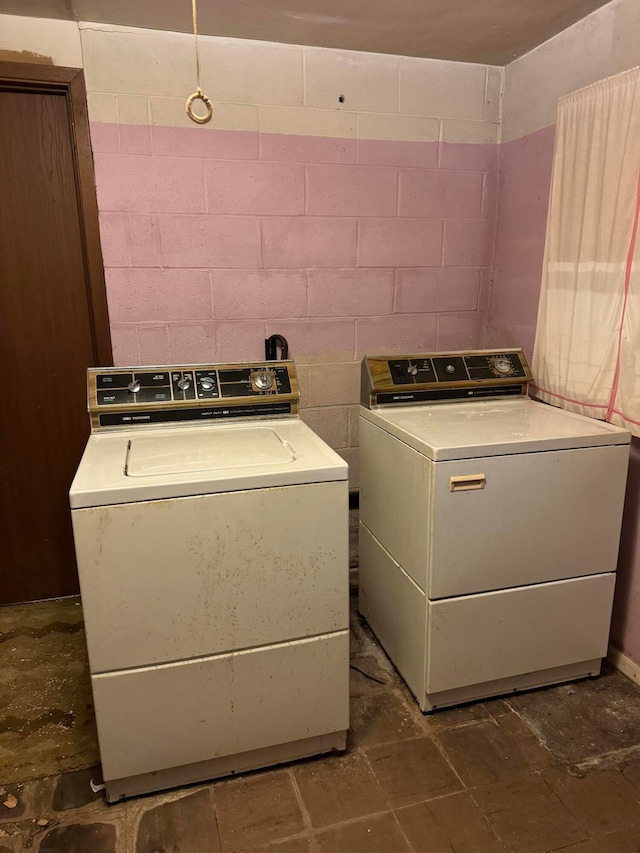 washroom with independent washer and dryer