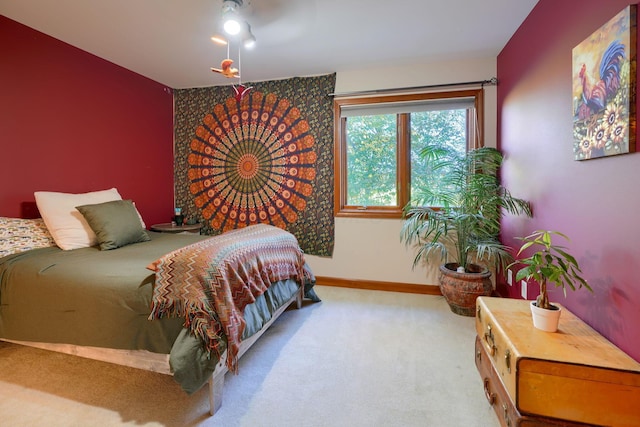 bedroom featuring carpet