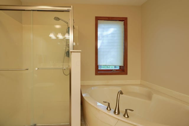 bathroom with independent shower and bath