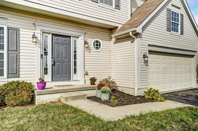 property entrance with a garage