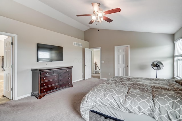 carpeted bedroom featuring ceiling fan and lofted ceiling