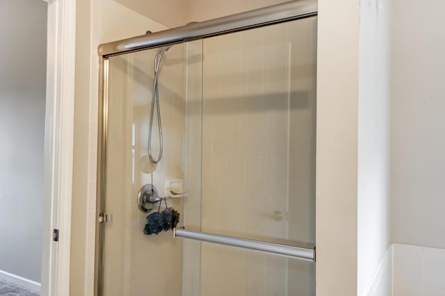 bathroom featuring walk in shower