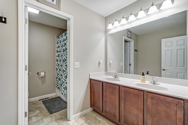 bathroom featuring vanity and shower / bath combination with curtain