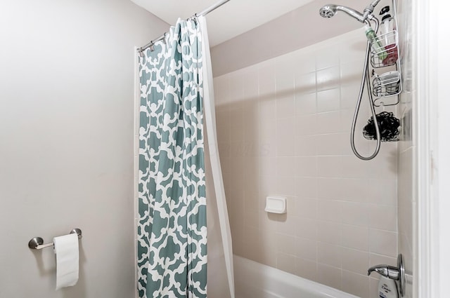 bathroom featuring shower / bathtub combination with curtain