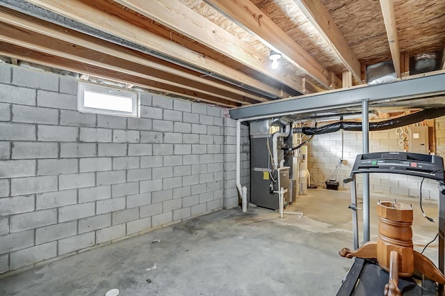 basement featuring heating unit and electric panel