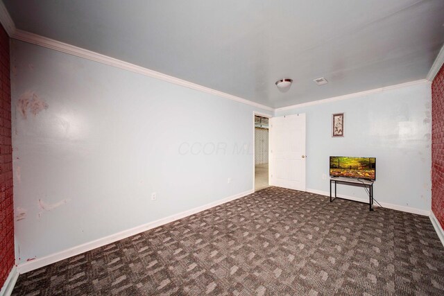 carpeted empty room with crown molding