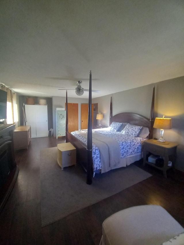 bedroom with hardwood / wood-style flooring and ceiling fan