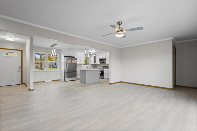 5608 Cardinal Dr, Orient, OH 43146 - unfurnished living room featuring a ceiling fan and crown molding