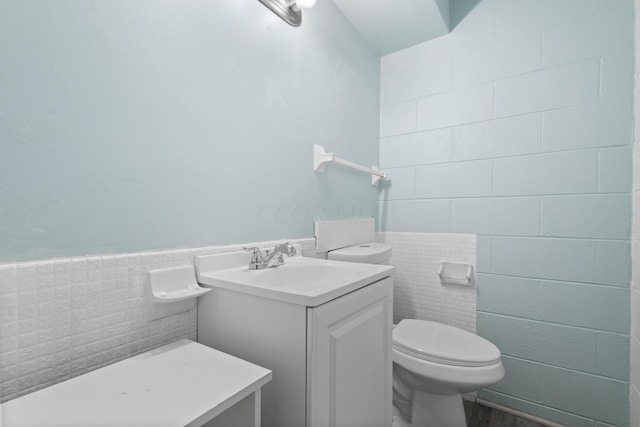 5608 Cardinal Dr, Orient, OH 43146 - half bath with tile walls, vanity, and wainscoting