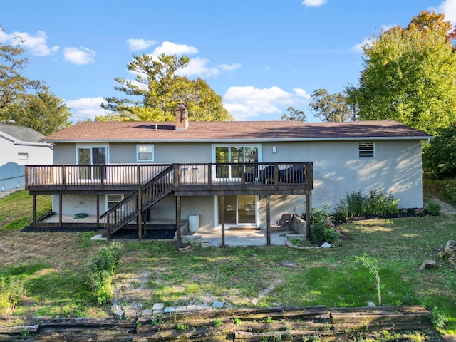 5608 Cardinal Dr, Orient, OH 43146 - rear view of property with a deck, a patio, stairs, and a lawn