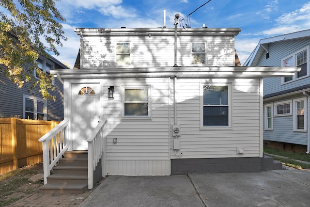 rear view of house with a patio