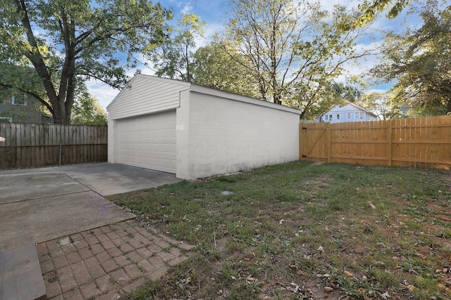 garage with a yard