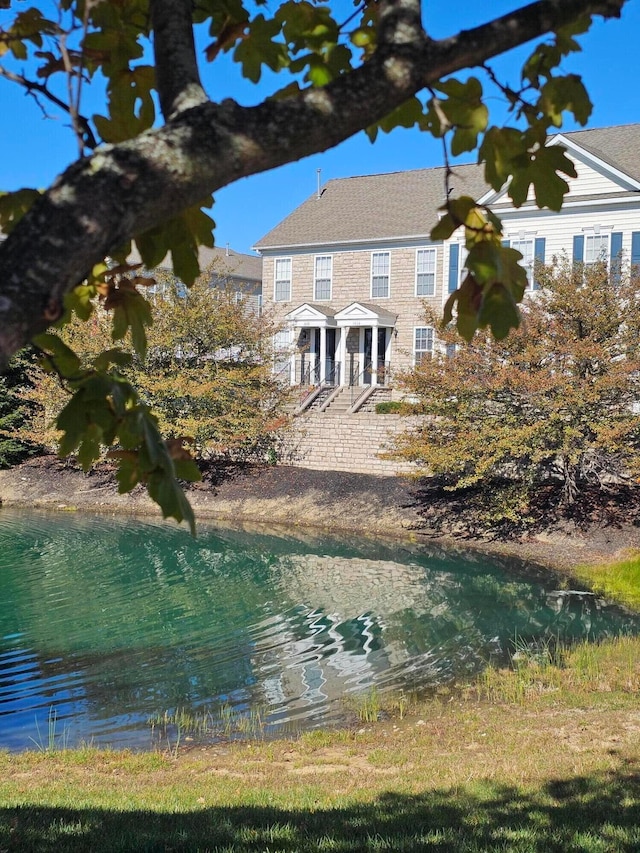 exterior space featuring a water view