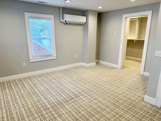 interior space featuring a wall mounted air conditioner