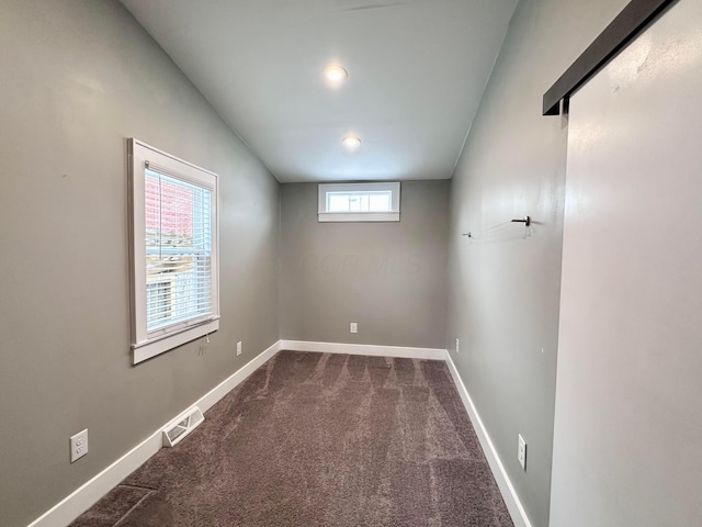 view of carpeted spare room