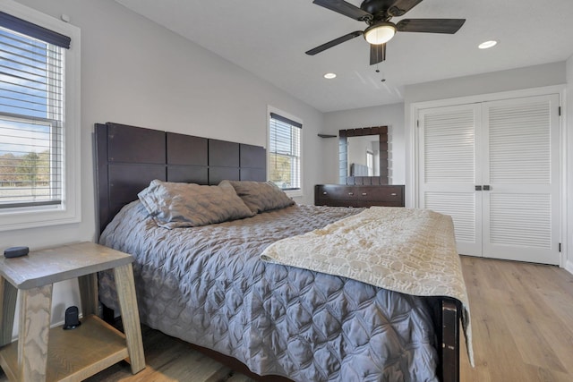 bedroom featuring ceiling fan and light wood-type flooring