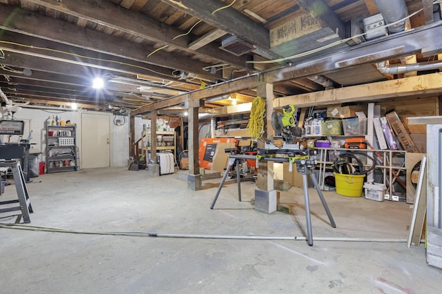 basement with a workshop area