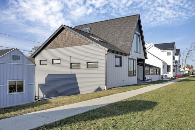 view of property exterior with a yard