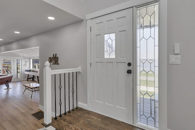 entryway featuring hardwood / wood-style floors, a wealth of natural light, and pool table