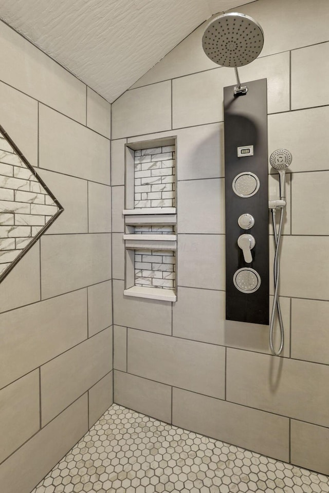 details featuring tiled shower