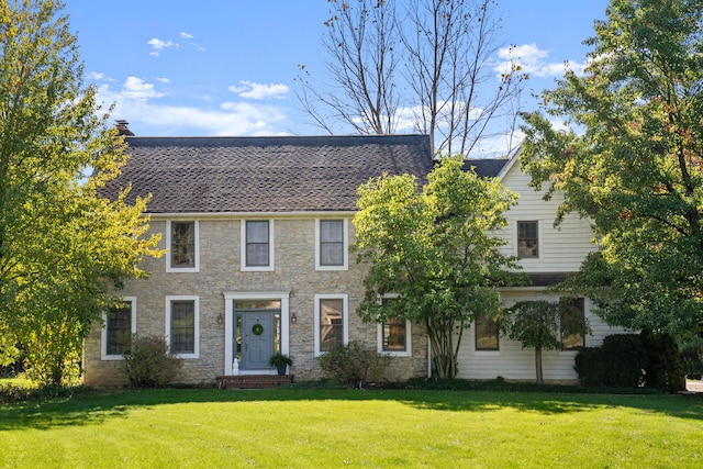 view of front of home with a front yard