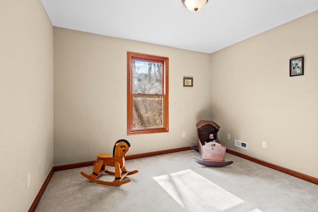 sitting room with light carpet