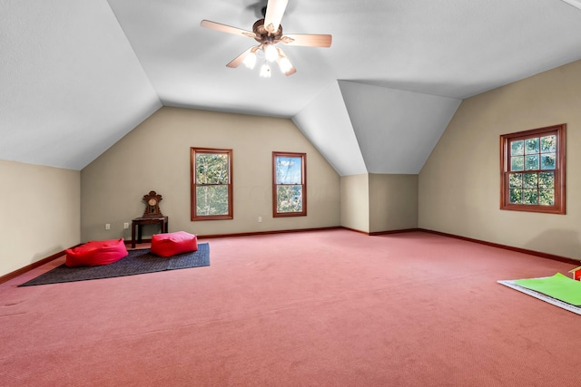 bonus room with ceiling fan, carpet, and lofted ceiling