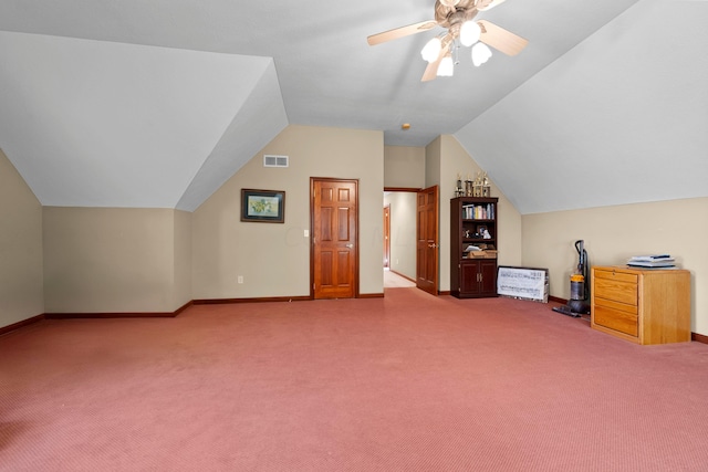 bonus room with carpet, ceiling fan, and vaulted ceiling