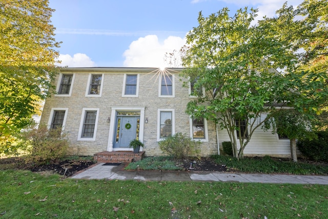 view of front of house with a front lawn