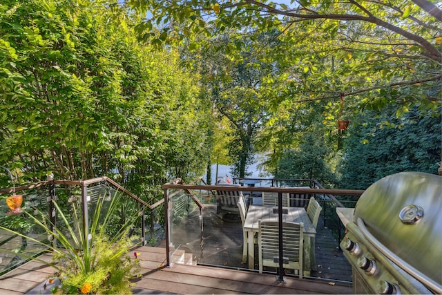 wooden deck with area for grilling