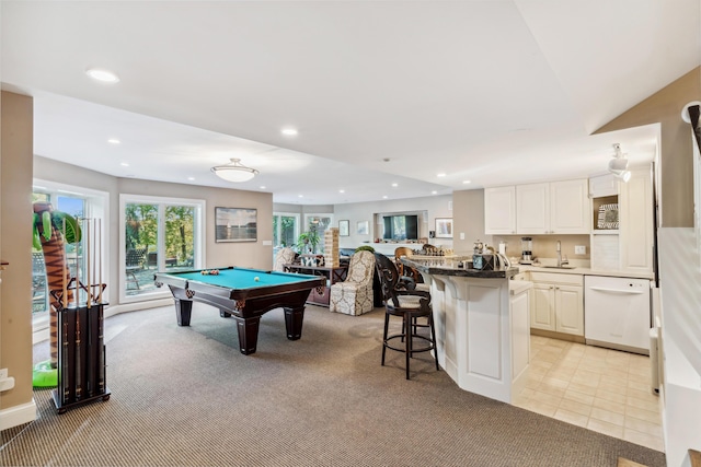 rec room featuring light carpet, pool table, and sink